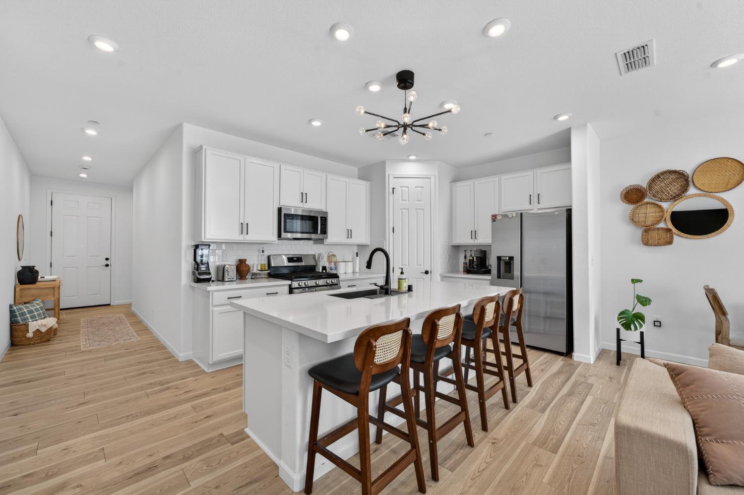 11986 Granzella Way Rancho Cordova, CA 95742 - Photo 2 of 55 Kitchen Quartz Counter, Gas Range, Built-in Microwave, Island perfect for Breakfast. Don't miss the Closet Pantry