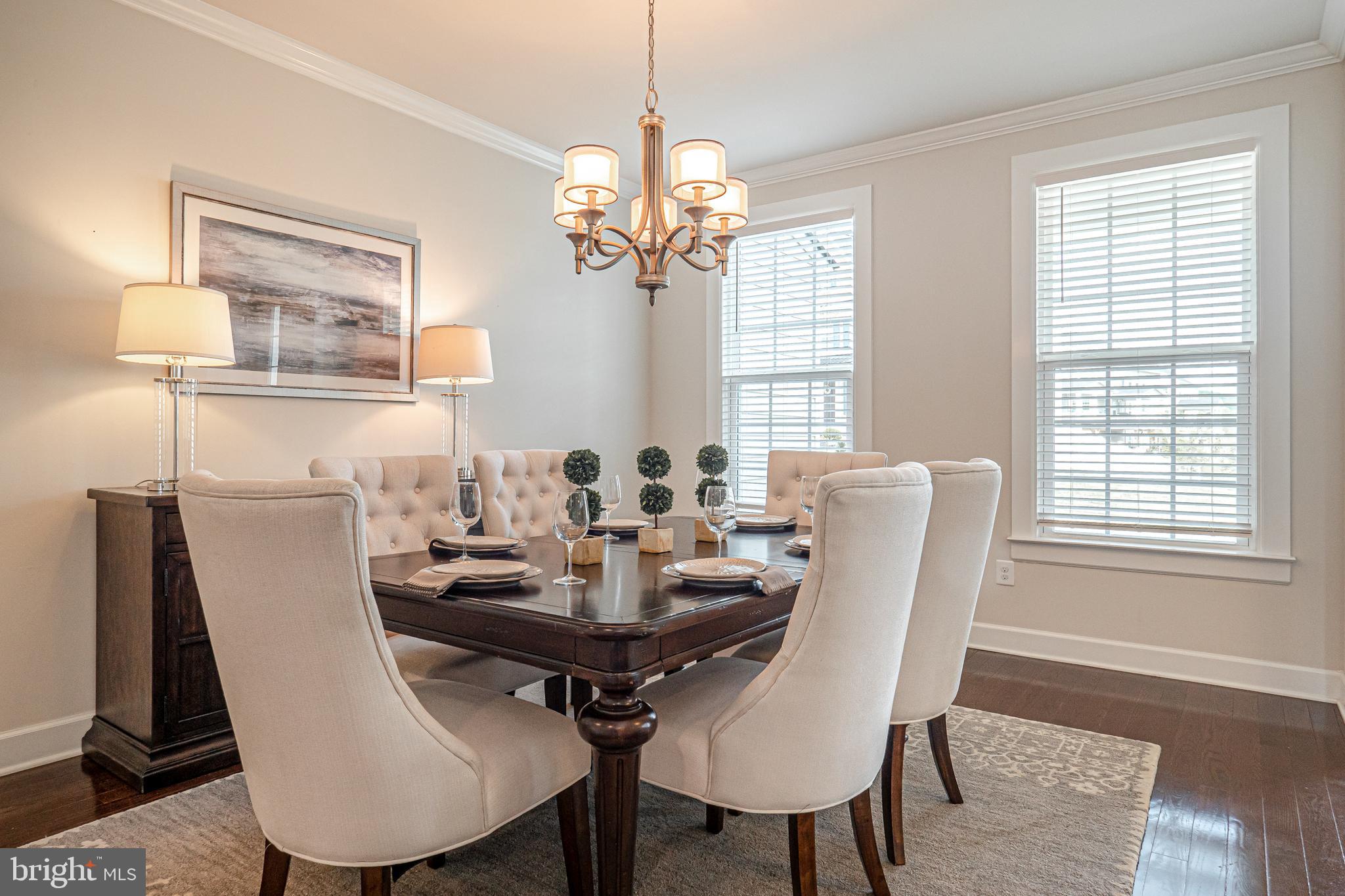 731 Stonecliffe Road Malvern, PA 19355 - Photo 11 of 81 a view of a dining room with furniture window and wooden floor