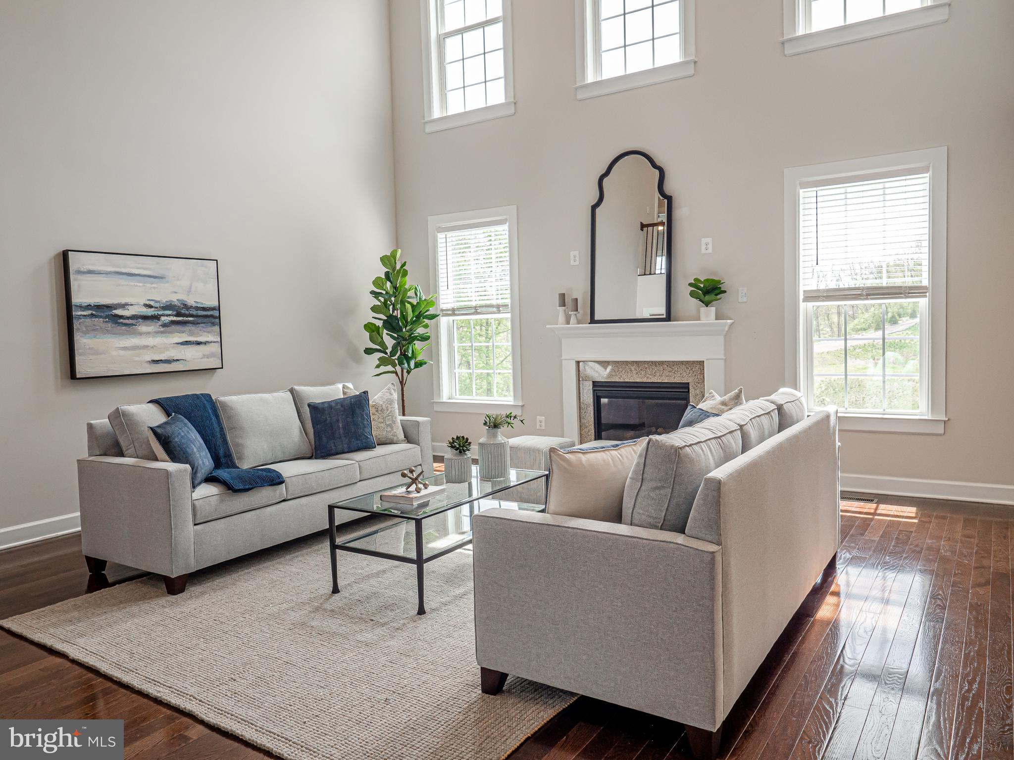 731 Stonecliffe Road Malvern, PA 19355 - Photo 14 of 81 a living room with furniture and a fireplace
