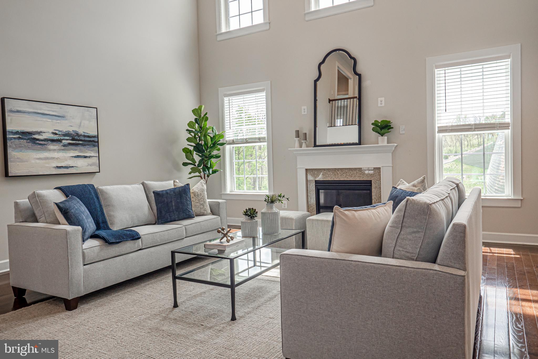 731 Stonecliffe Road Malvern, PA 19355 - Photo 15 of 81 a living room with furniture and a fireplace