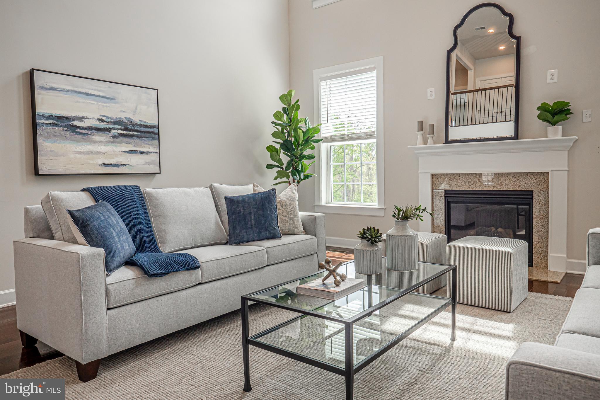 731 Stonecliffe Road Malvern, PA 19355 - Photo 16 of 81 a living room with furniture and a fireplace