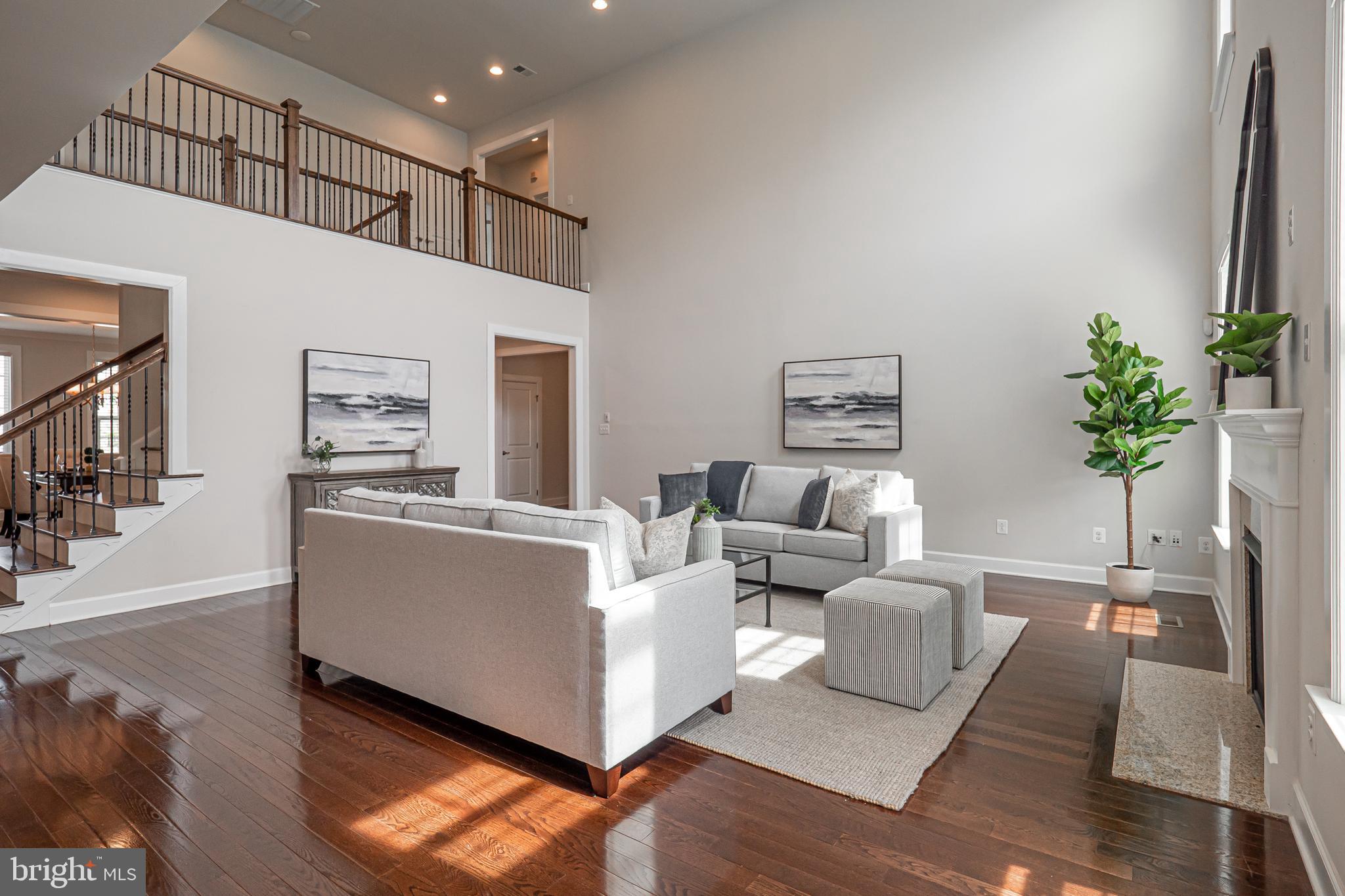 731 Stonecliffe Road Malvern, PA 19355 - Photo 17 of 81 a living room with furniture and a large window
