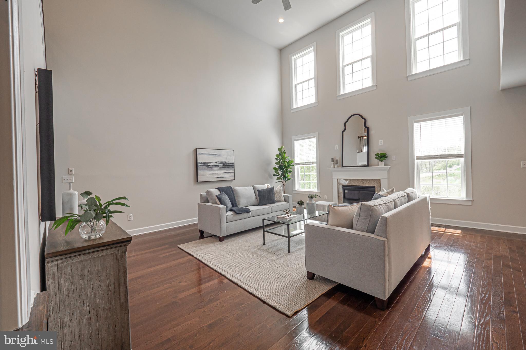731 Stonecliffe Road Malvern, PA 19355 - Photo 18 of 81 a living room with furniture fireplace and a window