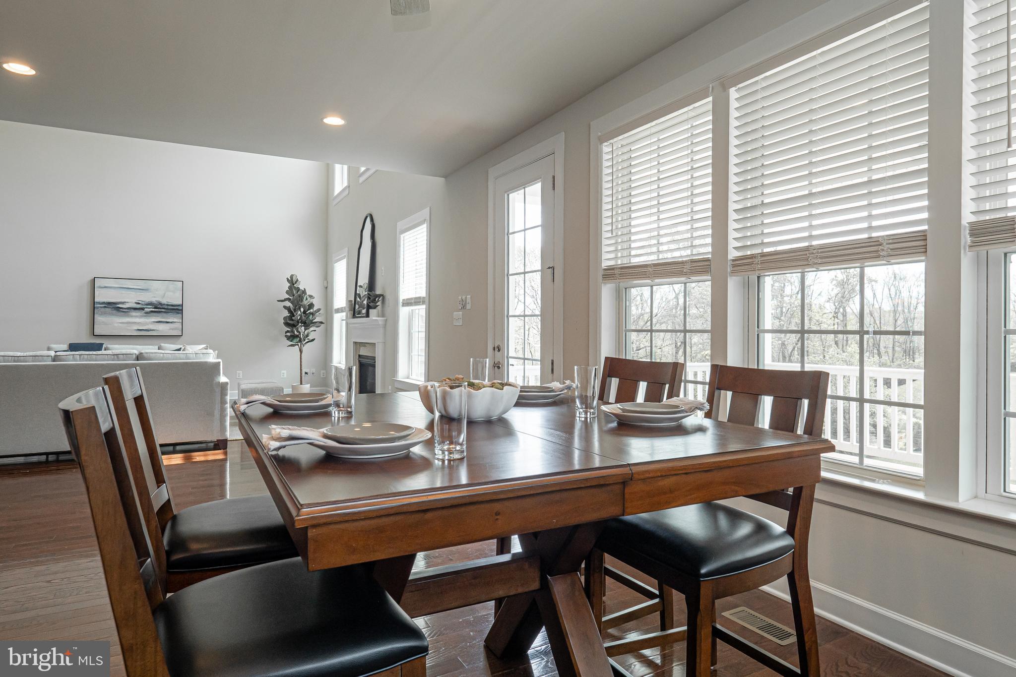 731 Stonecliffe Road Malvern, PA 19355 - Photo 25 of 81 a dining room with furniture and wooden floor