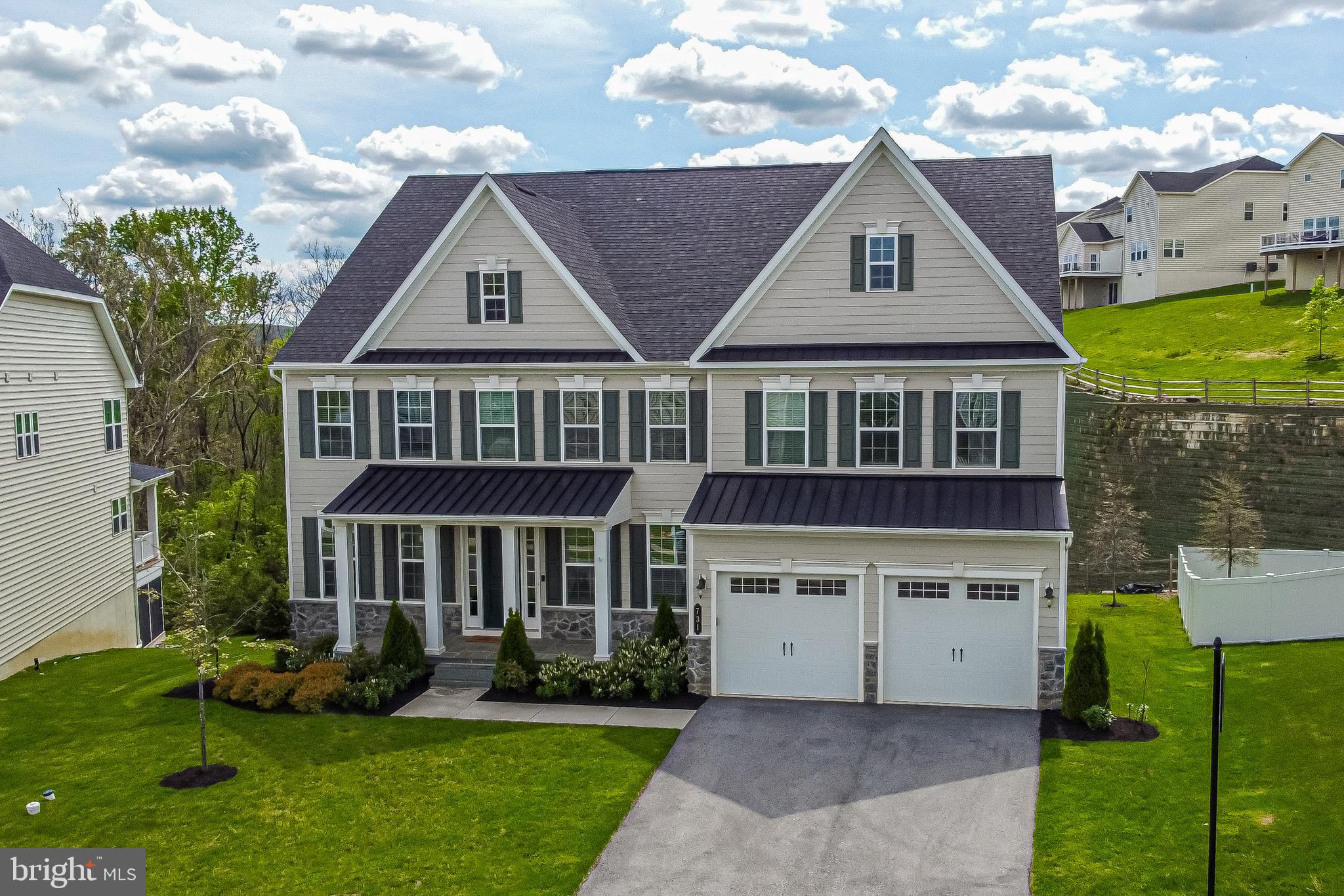 731 Stonecliffe Road Malvern, PA 19355 - Photo 3 of 81 a front view of a house with a yard