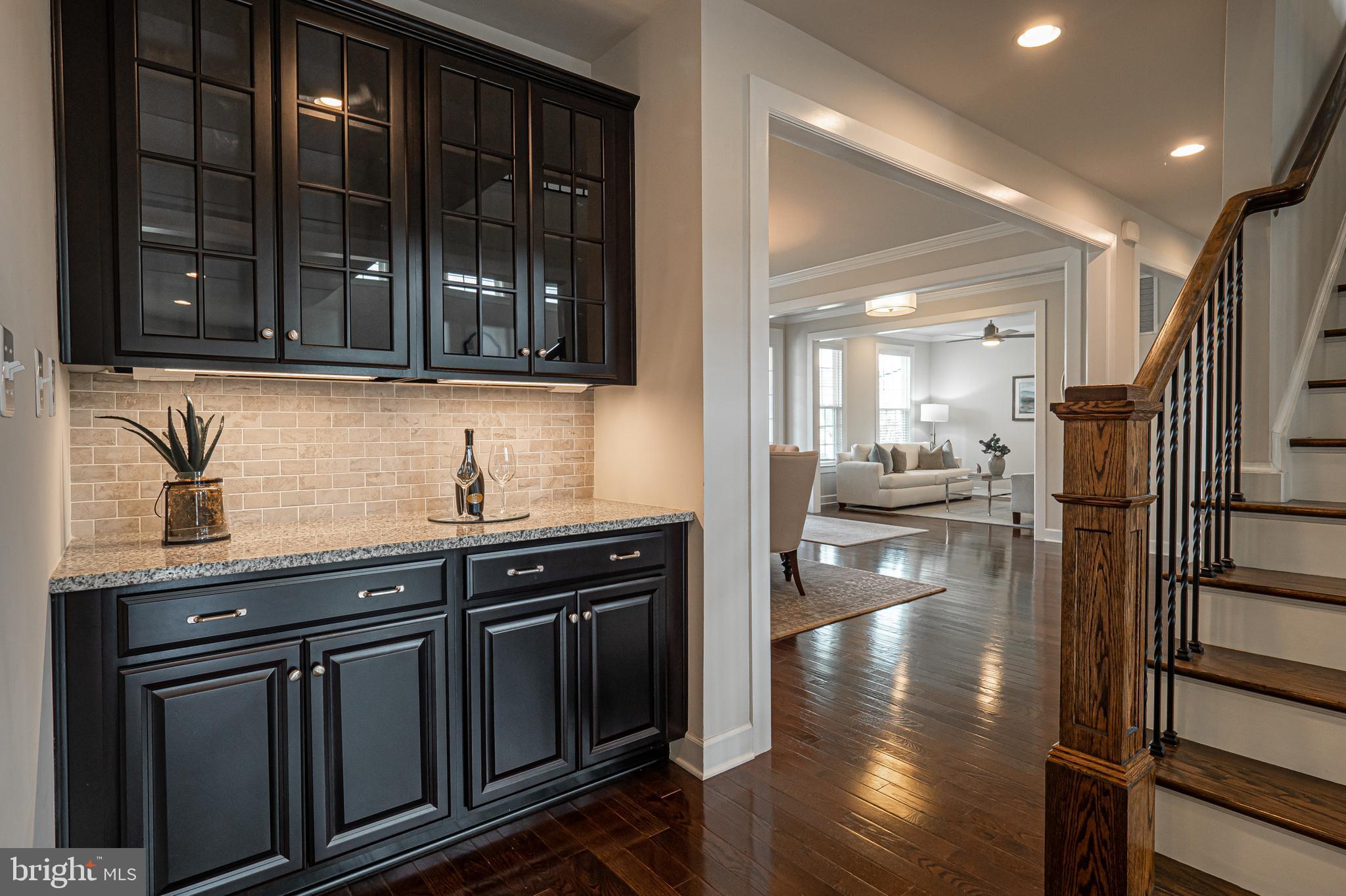 731 Stonecliffe Road Malvern, PA 19355 - Photo 34 of 81 a kitchen with stainless steel appliances granite countertop a refrigerator and a sink
