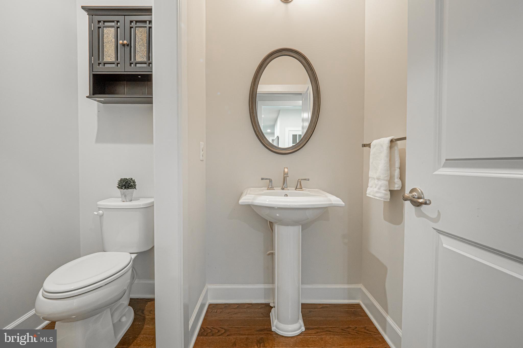 731 Stonecliffe Road Malvern, PA 19355 - Photo 37 of 81 a bathroom with a toilet sink and mirror