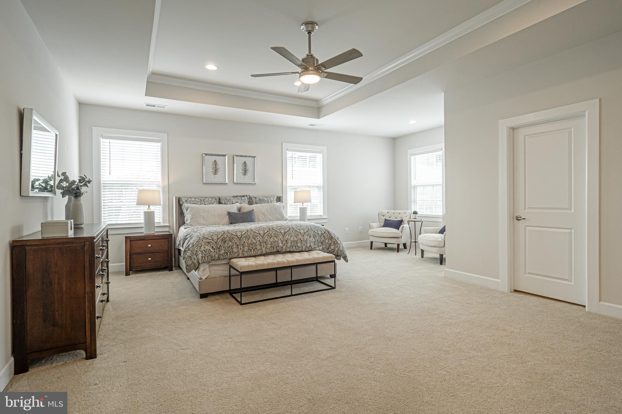 731 Stonecliffe Road Malvern, PA 19355 - Photo 43 of 81 a bedroom with a large bed and a chandelier