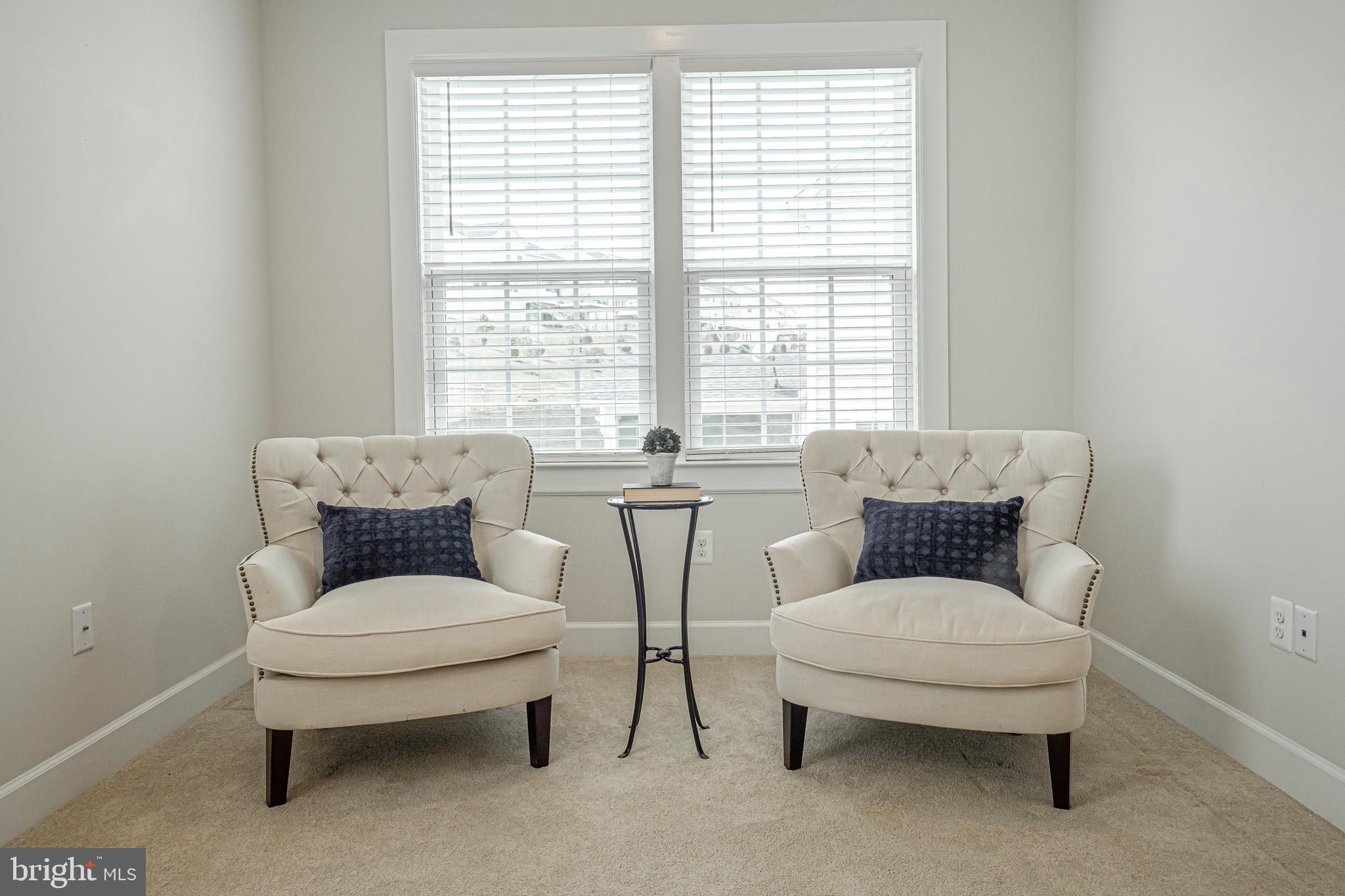 731 Stonecliffe Road Malvern, PA 19355 - Photo 47 of 81 a living room with furniture and a large window