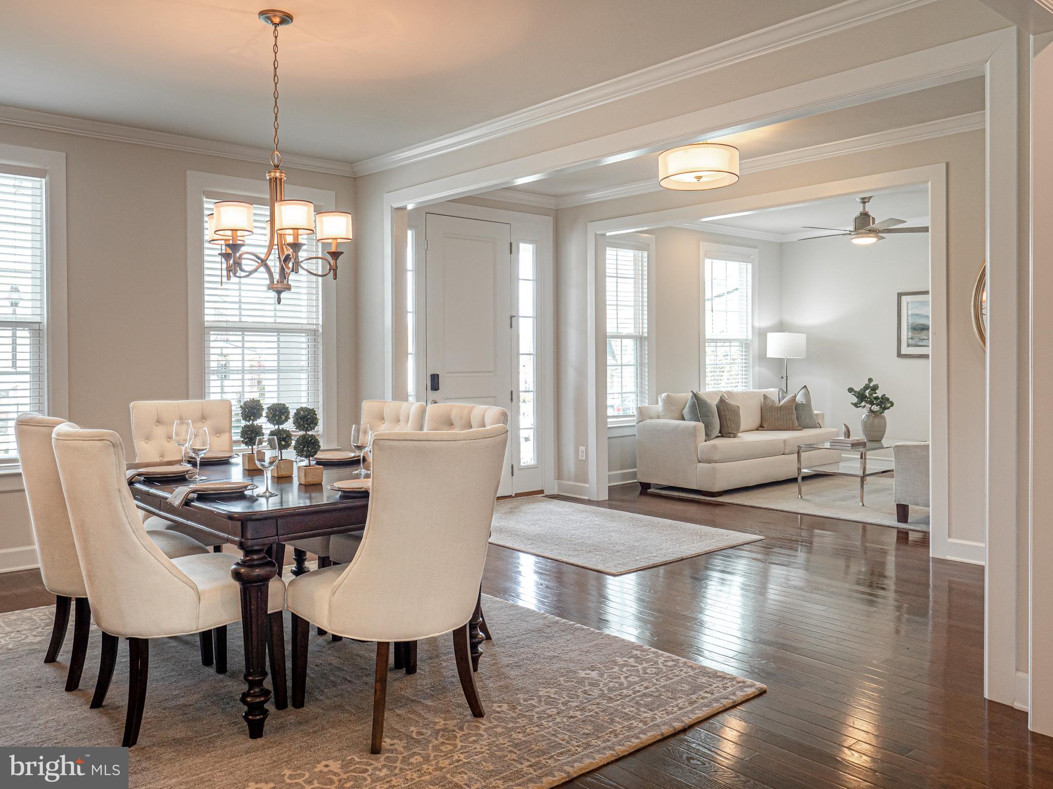 731 Stonecliffe Road Malvern, PA 19355 - Photo 9 of 81 a view of a dining room with furniture window and wooden floor