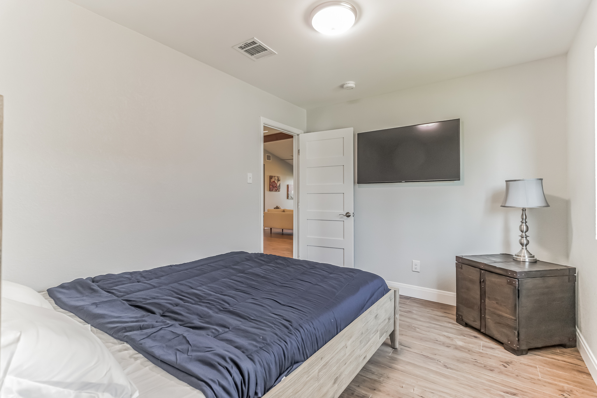 11406 Ruffed Grouse Drive Austin, TX 78758 - Photo 17 of 22 Smooth wood-look flooring and clean white walls define this restful personal retreat.
