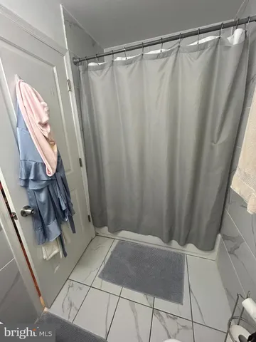 a view of a room with door and stairs