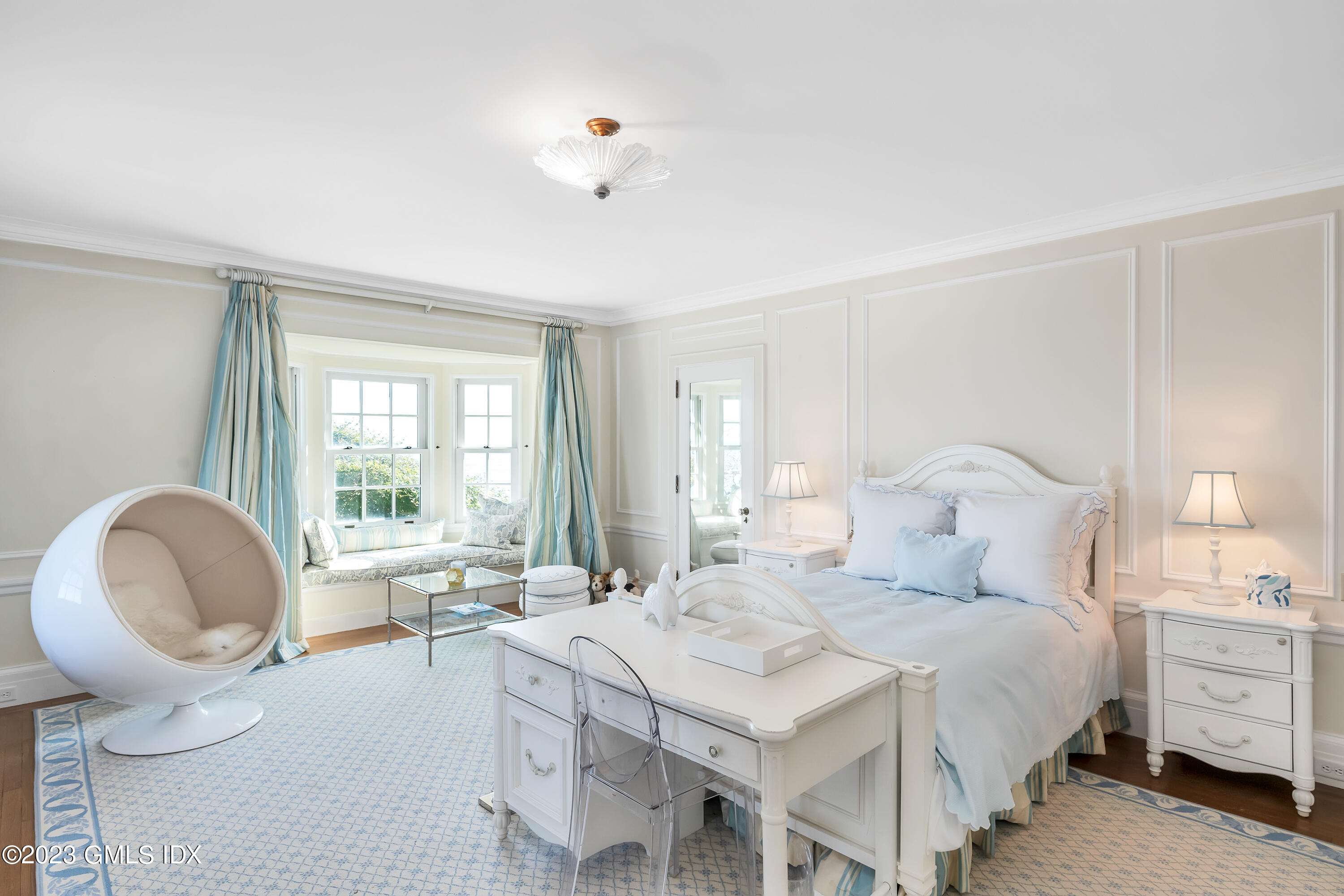 140 Wallacks Drive Stamford, CT 06902 - Photo 12 of 26 a spacious bedroom with a bed and a large window