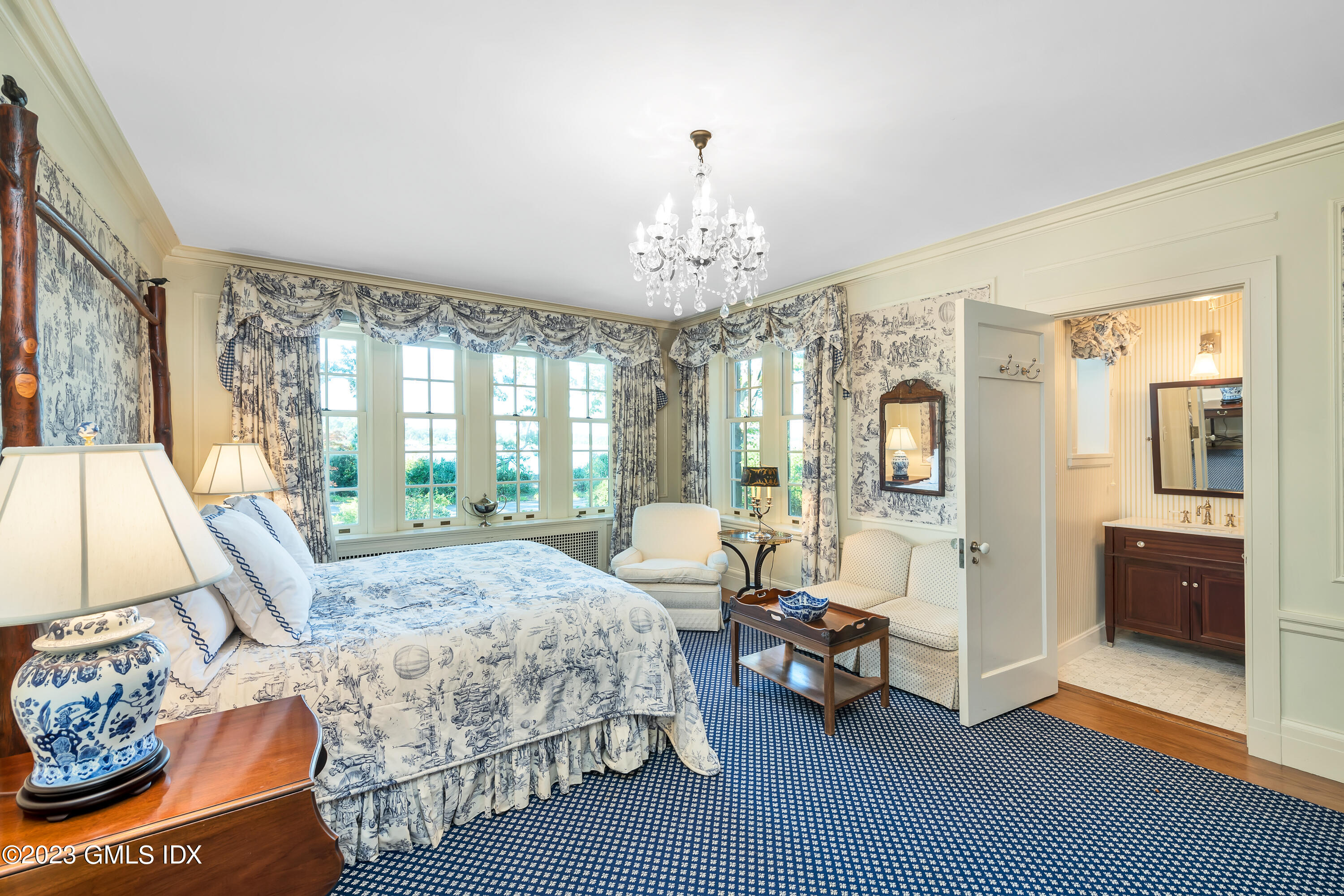 140 Wallacks Drive Stamford, CT 06902 - Photo 13 of 26 a living room with furniture and a chandelier