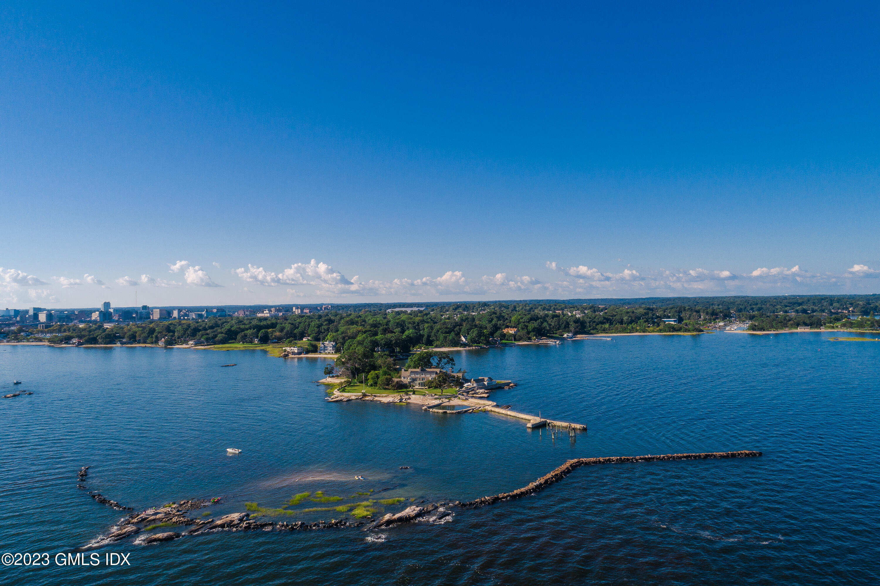 140 Wallacks Drive Stamford, CT 06902 - Photo 25 of 26 a view of a lake with lawn chairs
