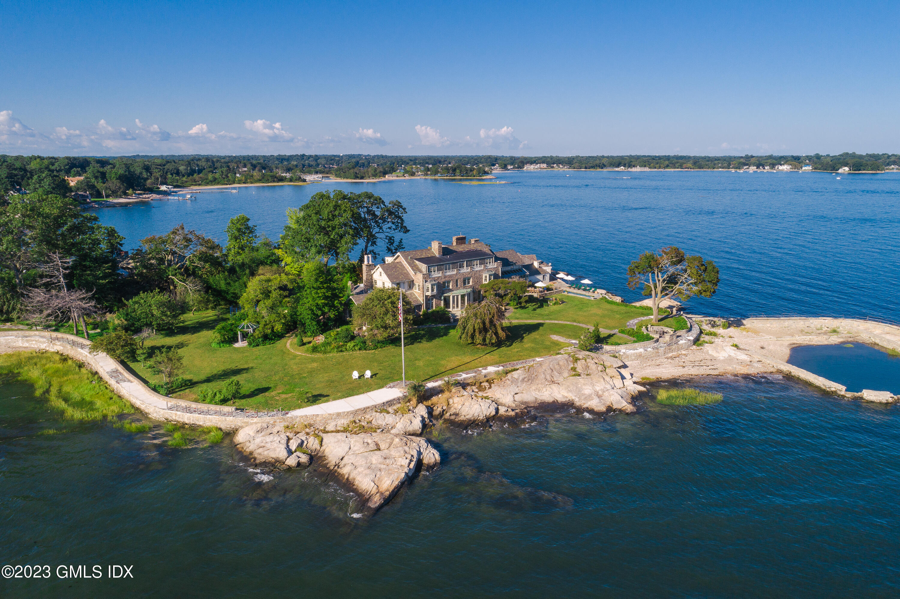 140 Wallacks Drive Stamford, CT 06902 - Photo 3 of 26 a view of a lake with a big yard