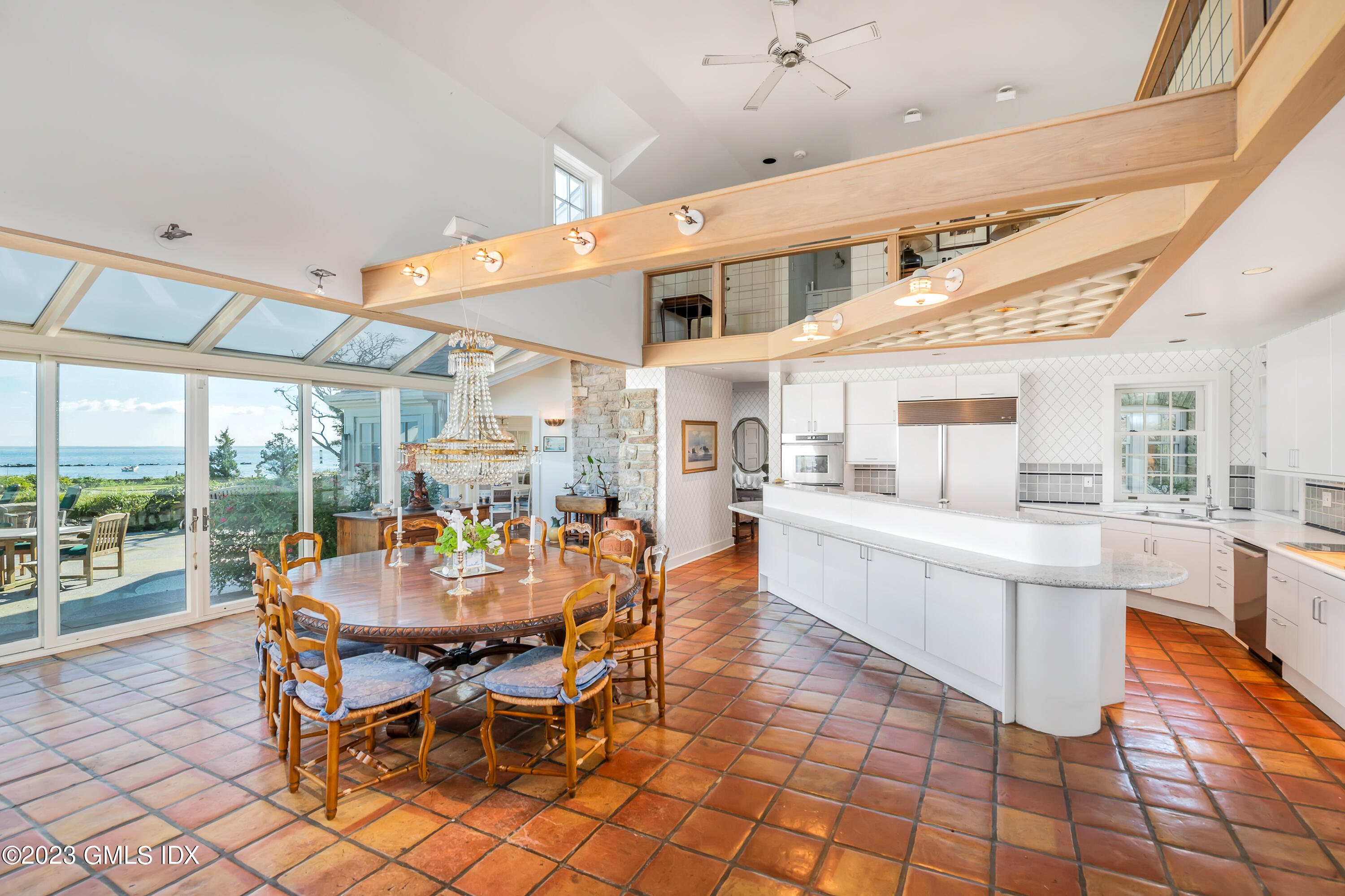 140 Wallacks Drive Stamford, CT 06902 - Photo 10 of 26 a large dining hall with stainless steel appliances granite countertop a stove and cabinets