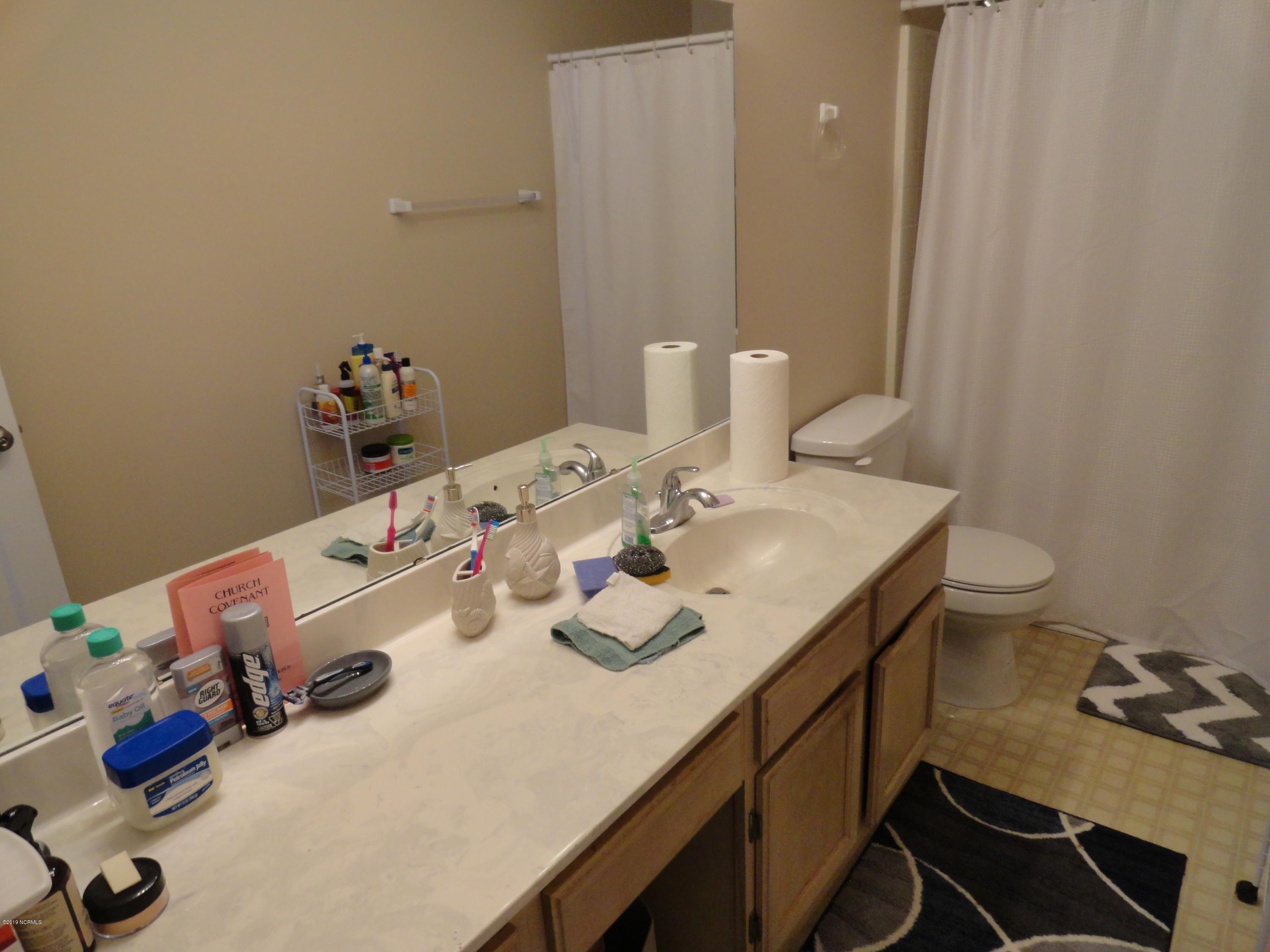 100 Christopher Court Havelock, NC 28532 - Photo 6 of 11 Super long vanity in Owners Suite