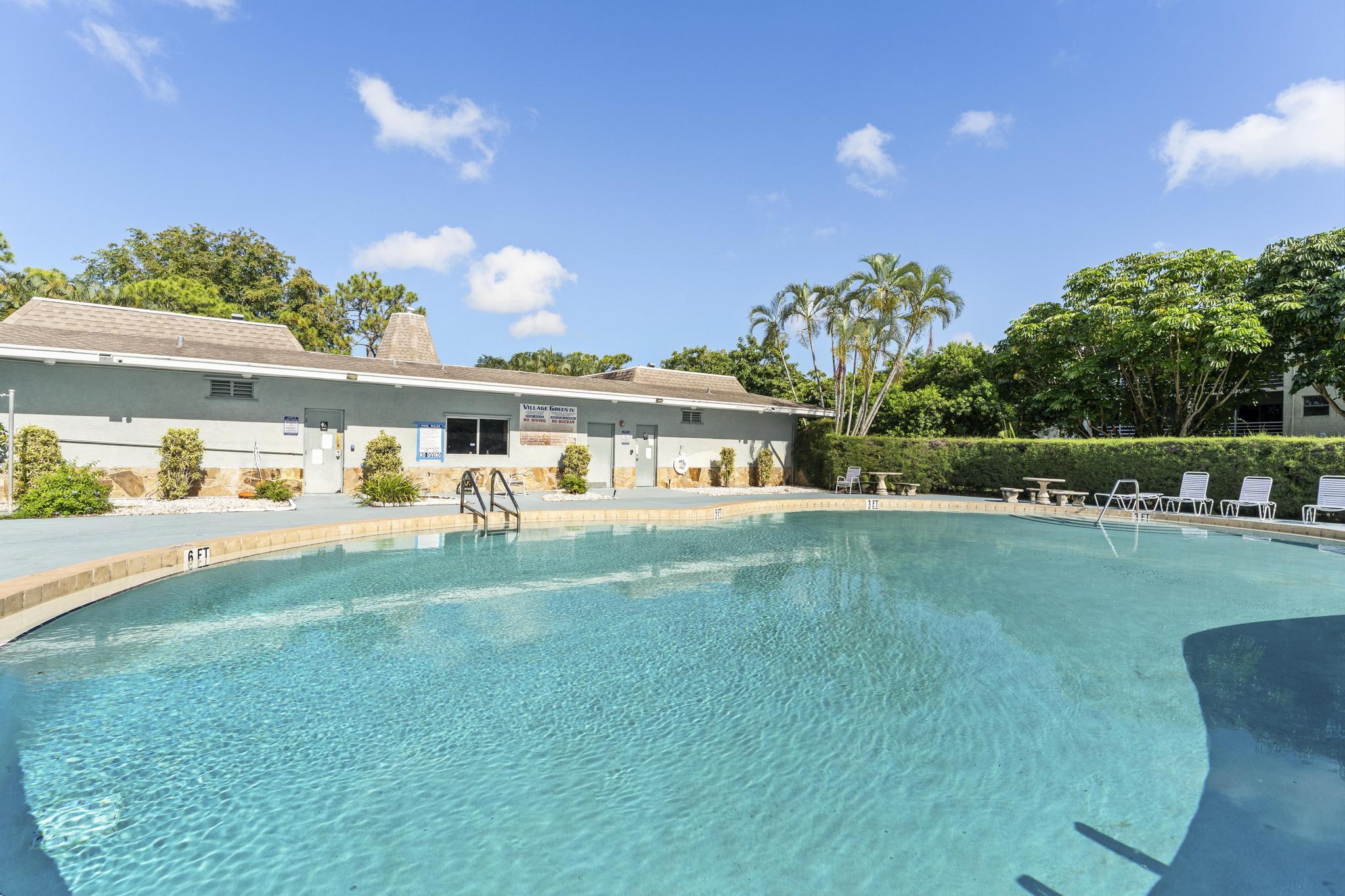 2000 Springdale Boulevard, Unit 209 Palm Springs, FL 33461 - Photo 25 of 26 a view of a house with a big yard