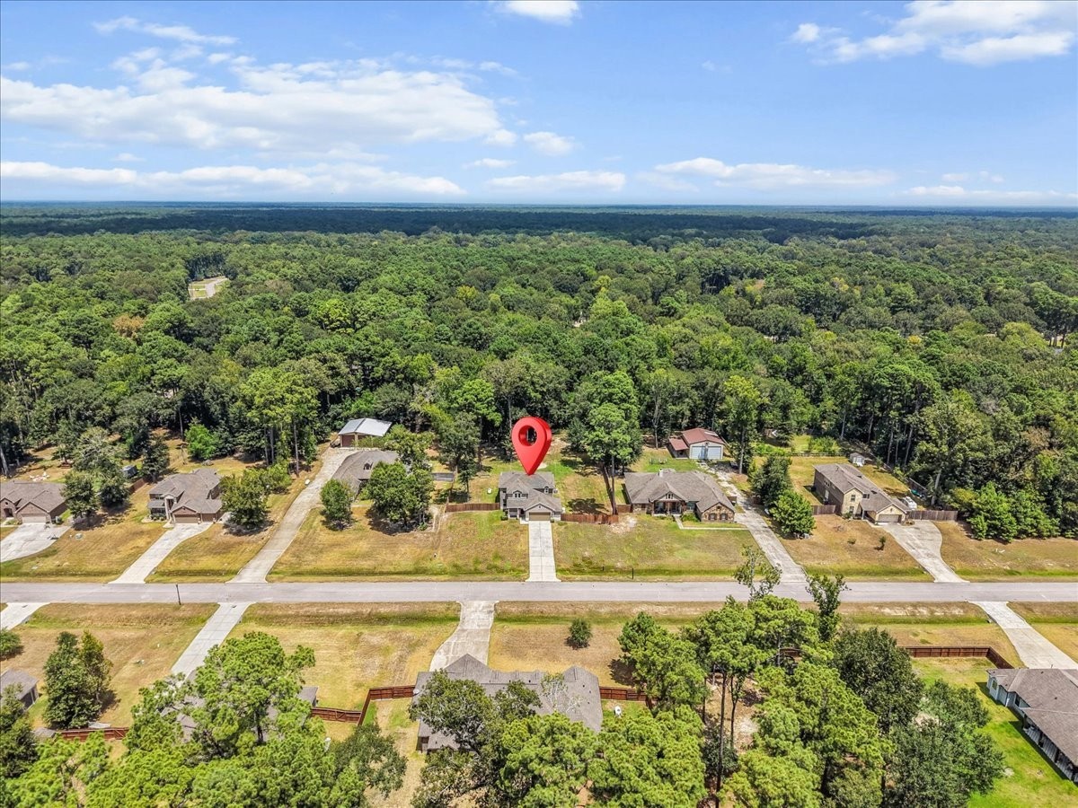 28619 Riverside Crest Lane Huffman, TX 77336 - Photo 41 of 48 Surrounded by mature trees and open space, this peaceful setting feels tucked away while remaining close to city conveniences.