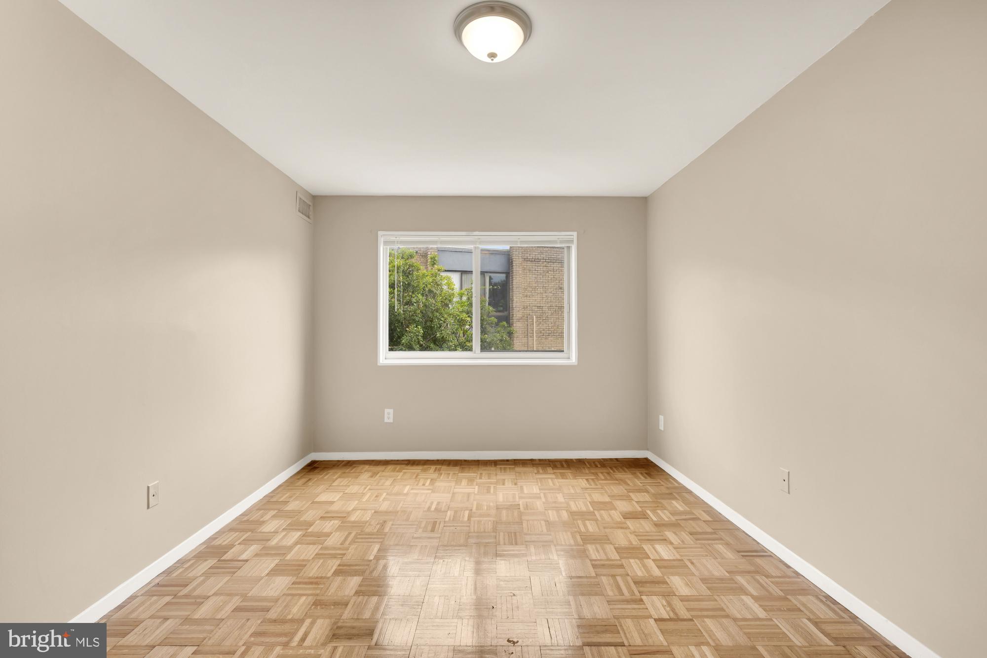 7056 Eastern Avenue Northwest, Unit 107 Washington, DC 20012 - Photo 21 of 36 Bedroom One