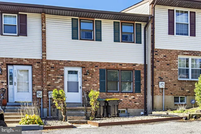 a front view of a building with street