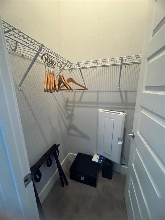 7770 Sandy Ridge Drive, Unit 210 Reunion, FL 34747 - Photo 22 of 42 a utility room with dryer and washer