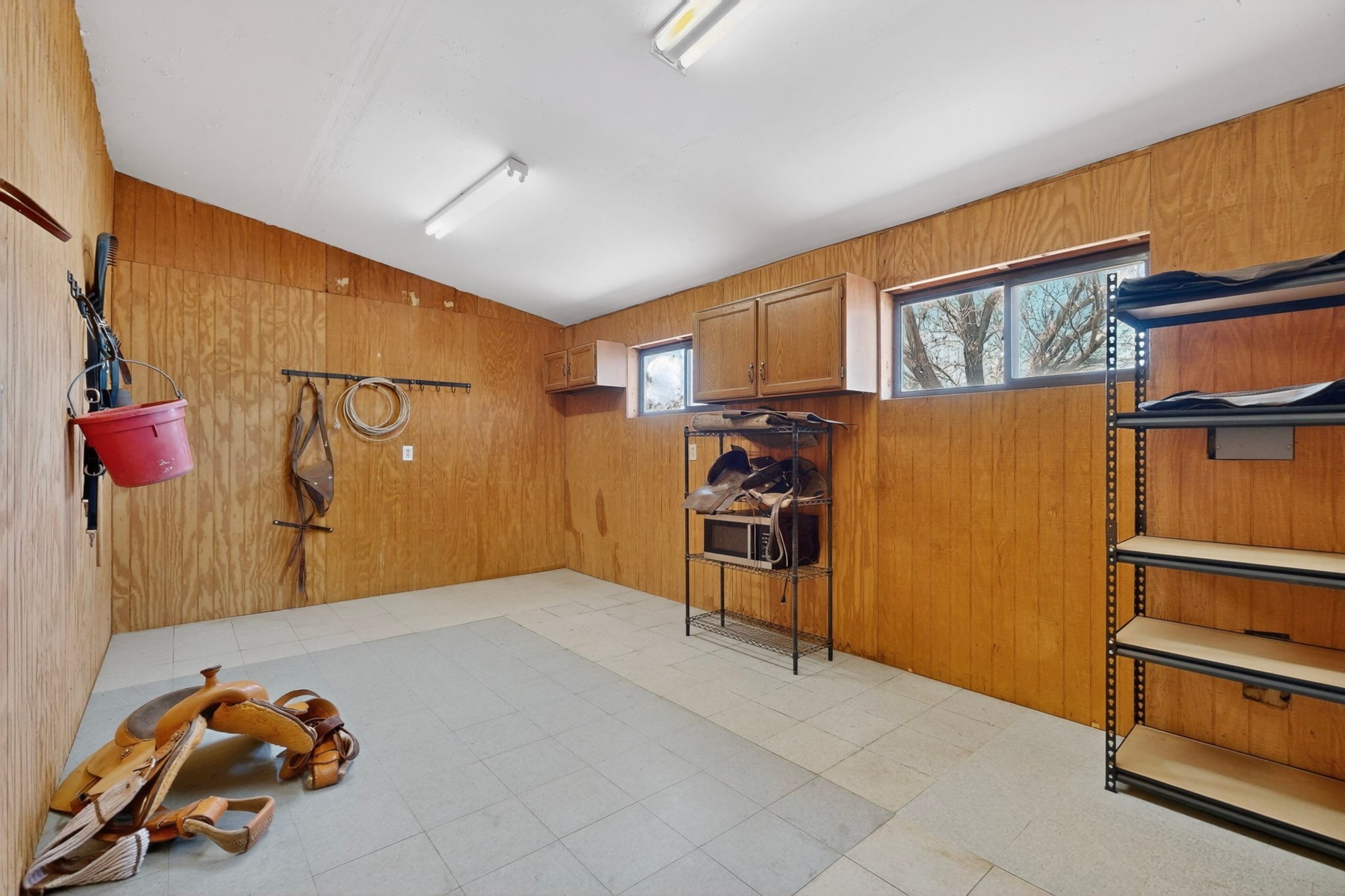 10 Blue Mesa Road Santa Fe, NM 87508 - Photo 53 of 63 Tack room next to the bunk room