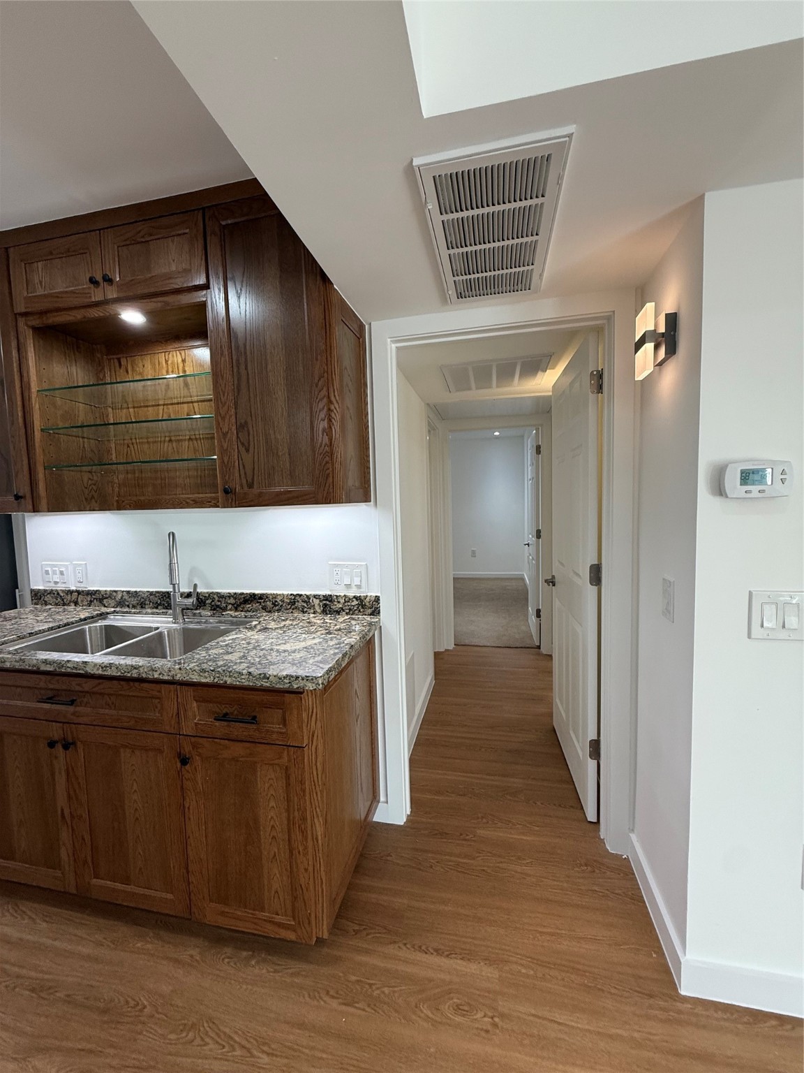 3400 Timmons Lane, Unit 52 56 Houston, TX 77027 - Photo 18 of 40 a view of a kitchen cabinets a sink and a stove