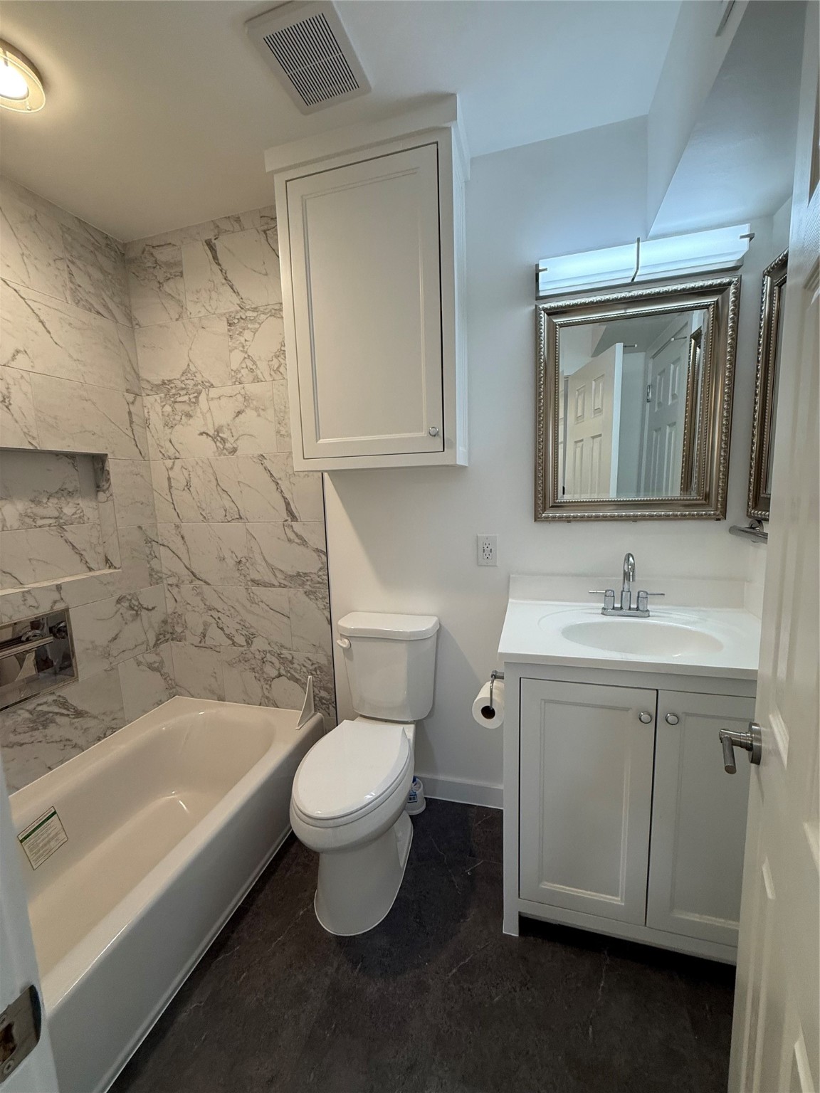 3400 Timmons Lane, Unit 52 56 Houston, TX 77027 - Photo 23 of 40 a bathroom with a sink toilet and shower