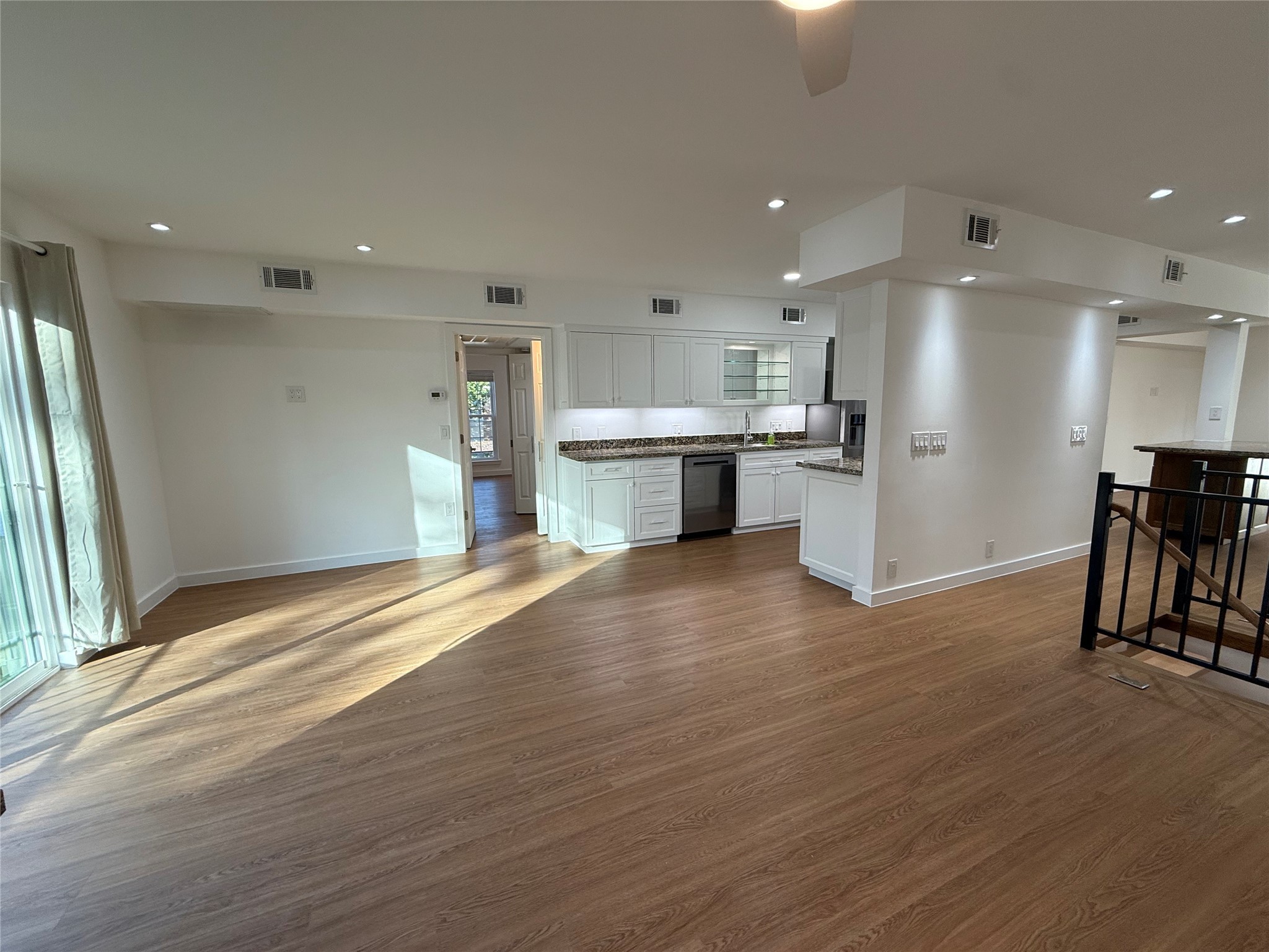 3400 Timmons Lane, Unit 52 56 Houston, TX 77027 - Photo 6 of 40 a large kitchen with a sink and a large window