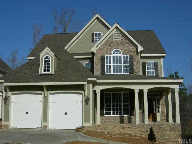9316 Tabriz Raleigh, NC 27614 - Photo 1 of 1 a front view of a house with a garage