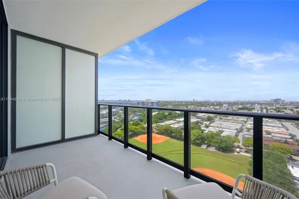 a view of a city from a balcony