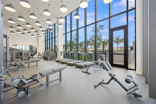 a view of a room with gym equipment