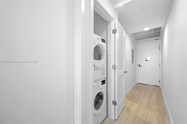 a view of walk in closet with window