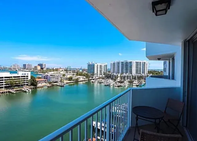 a view of swimming pool from a balcony