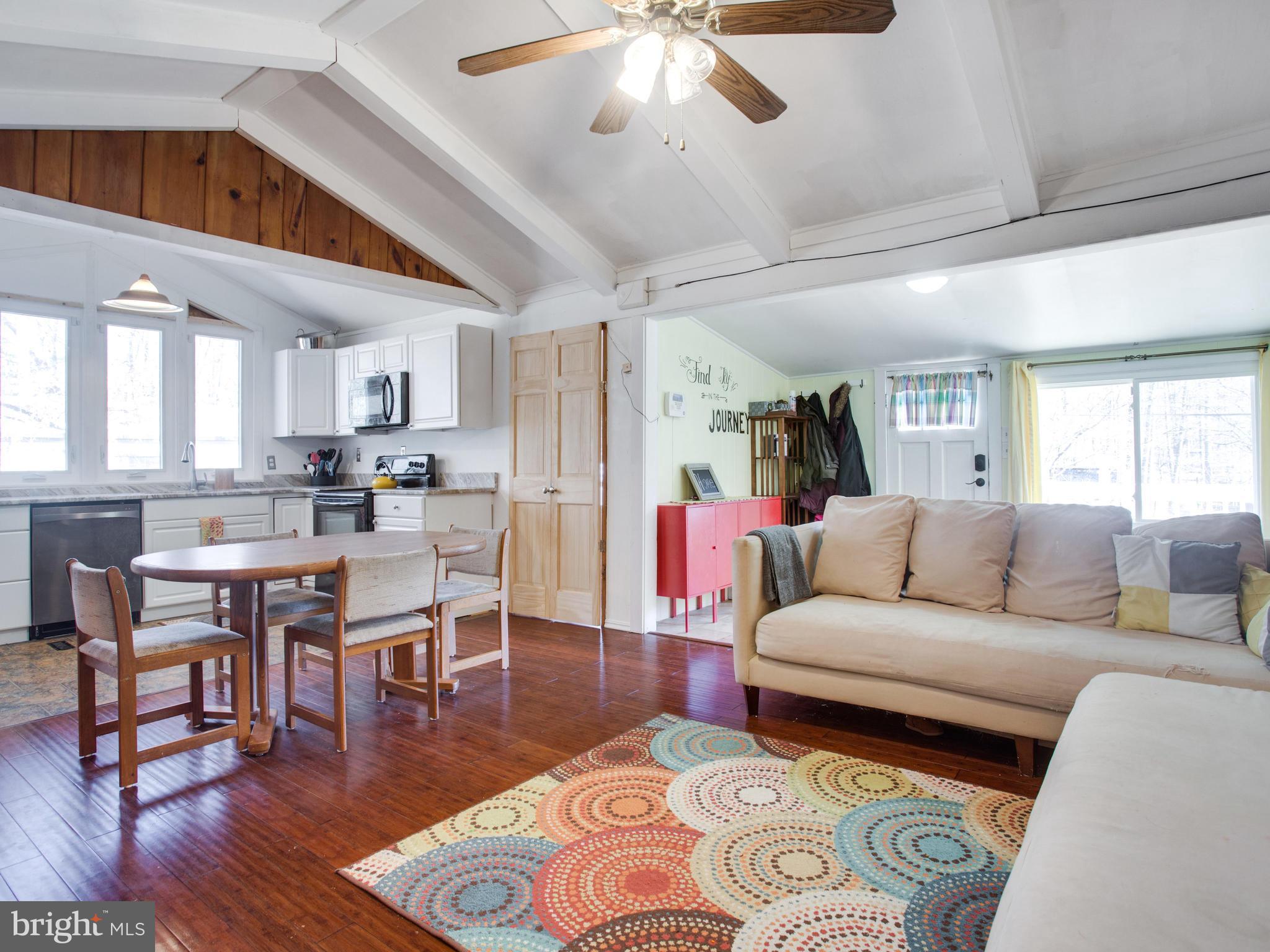 Vaulted Ceilings/Beams/Hardwood Flooring