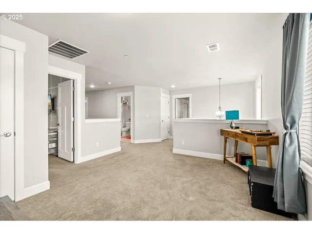 a view of a kitchen with furniture and a kitchen