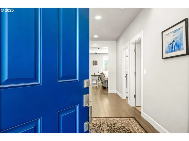 wooden floor in a hall with an entryway