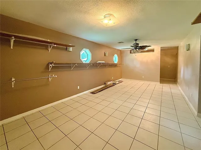 a bathroom with a double vanity sink and shower