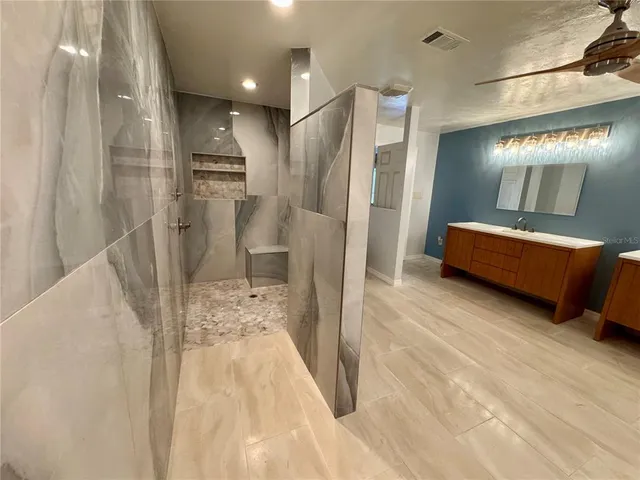 a utility room with cabinets