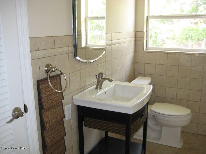 1624 Wavecrest Street Merritt Island, FL 32952 - Photo 18 of 25 Guest Bath & Linen