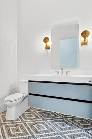 a bathroom with a sink and a toilet