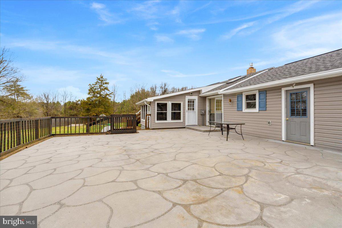 18711 Burnside Bridge Road Sharpsburg, MD 21782 - Photo 6 of 9 a view of a house with a patio
