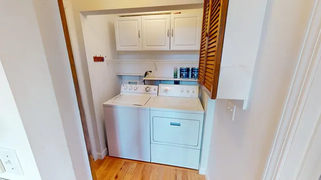 a utility room with washer and dryer