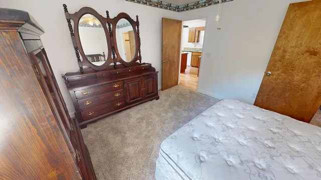 a view of front door with washer and dryer