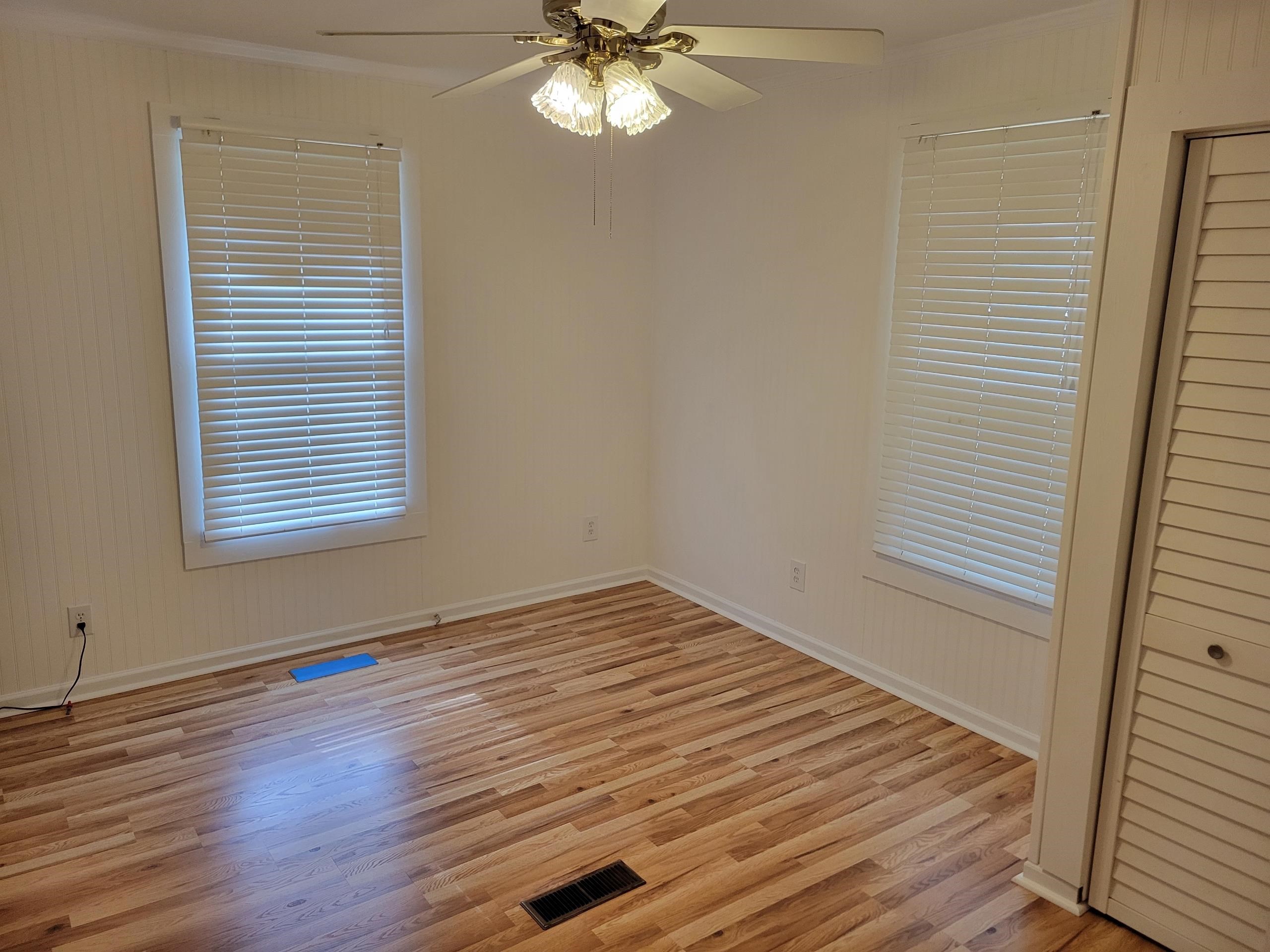 3580 Allandale Lane Memphis, TN 38111 - Photo 8 of 11 a view of a room with wooden floor and fan