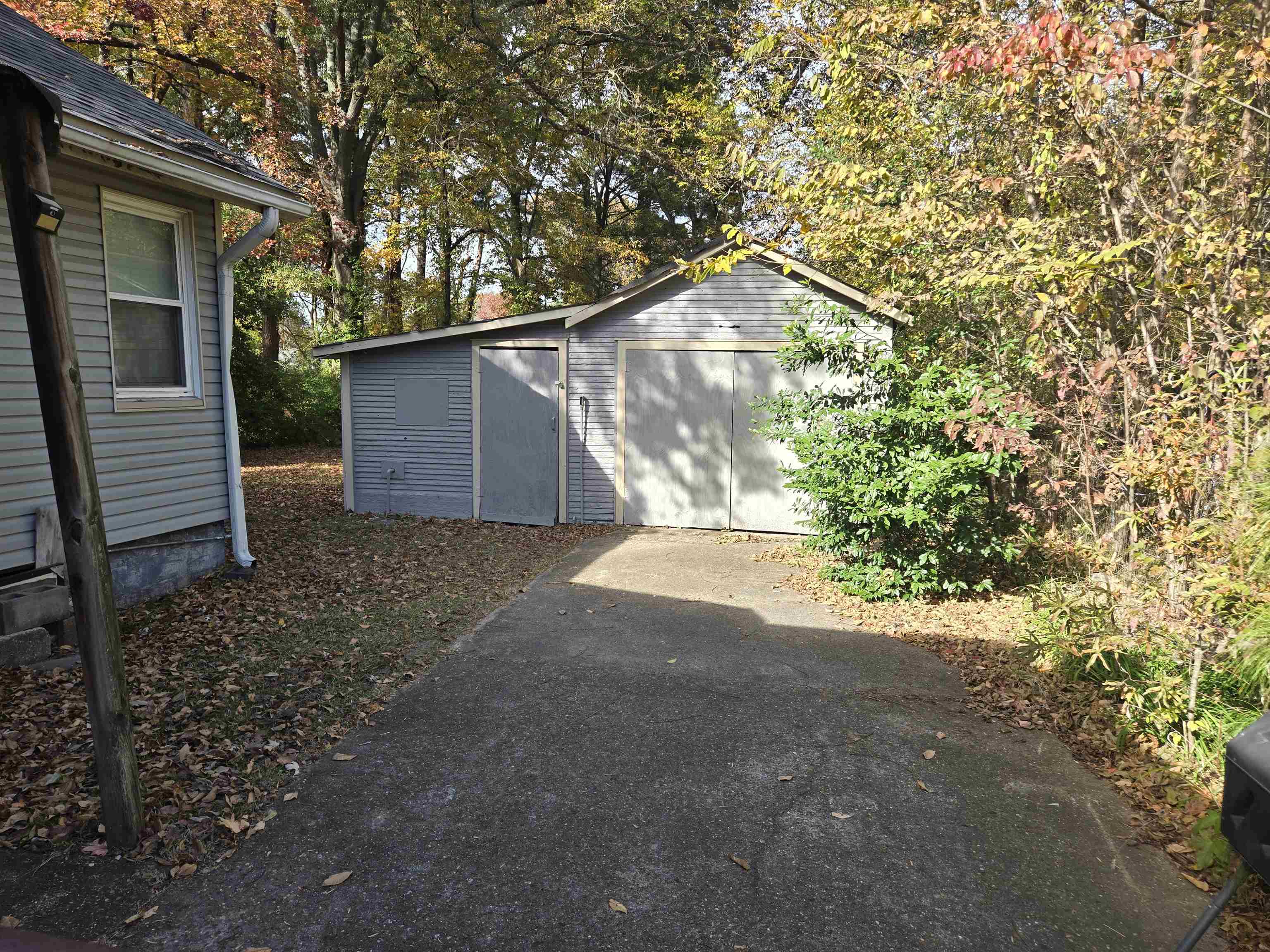 3580 Allandale Lane Memphis, TN 38111 - Photo 10 of 11 a view of a house with a tree and garage