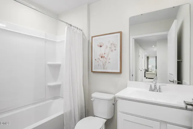 a bathroom with a sink a toilet and a bathtub