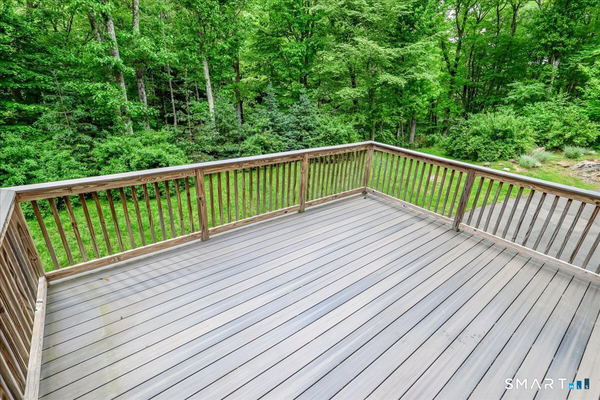 127 Putnam Park Road Bethel, CT 06801 - Photo 23 of 35 a view of balcony with deck and garden